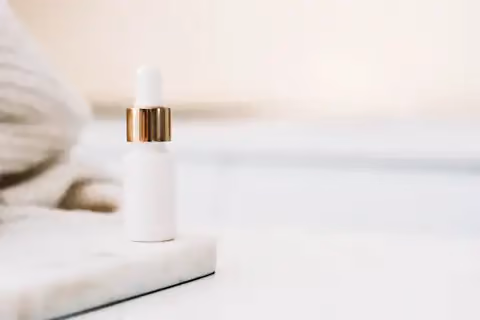Skincare bottle on a marble surface