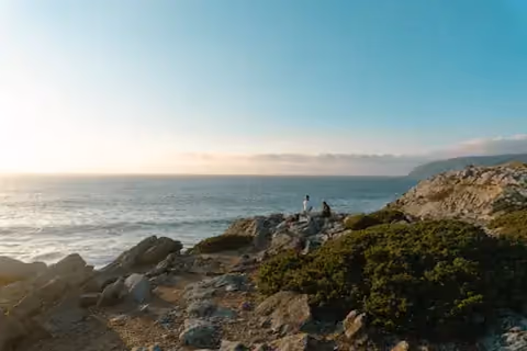 Sunrise over a rocky coastline